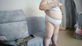 Mother-in-law with big tits caresses herself in front of the camera - 3 image