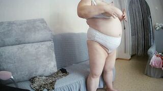 Mother-in-law with big tits caresses herself in front of the camera - 4 image