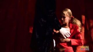 Busty blonde milf with a very nice rack and cute face sucks a big cock behind the curtain