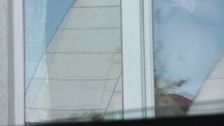 Neighbor taxi driver from window car again looks at neighbor MILF who washes window of apartment naked. Nude in public - 15 image