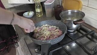 Mommy MILF without panties in stockings high heels continues nude cooking, shows pussy, boobs, nipples, butt and cooks pasta nautically  in kitchen. Ass pussy tits legs mom MILF - 1 image