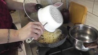 Mommy MILF without panties in stockings high heels continues nude cooking, shows pussy, boobs, nipples, butt and cooks pasta nautically  in kitchen. Ass pussy tits legs mom MILF - 12 image