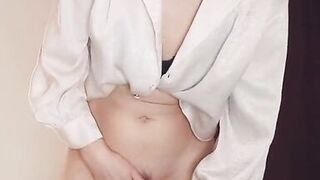 Horny the teacher fucks herself with a pink dildo while standing and cums