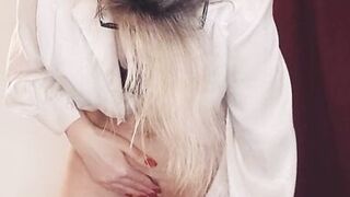 Horny teacher fucks herself with a dildo while standing