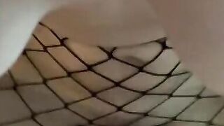 Brunette with a tight body shows off her new Halloween fishnet costume and fucks