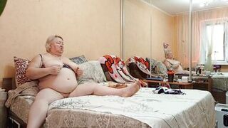 Mother-in-law masturbates her meaty pussy in the evenings and rubs her big tits - 11 image