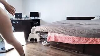 Sexy Latina Having Fun Trying on Clothes and Cutting Them. - 1 image